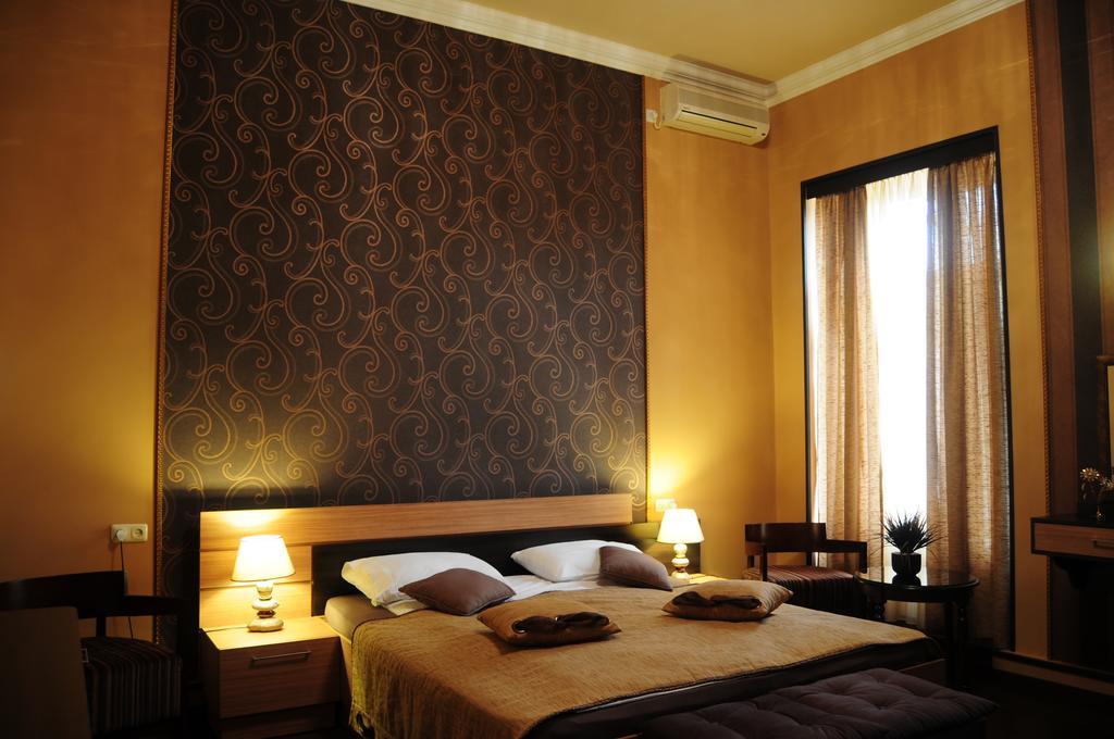 Azoyan Guest House Erevan Quarto foto